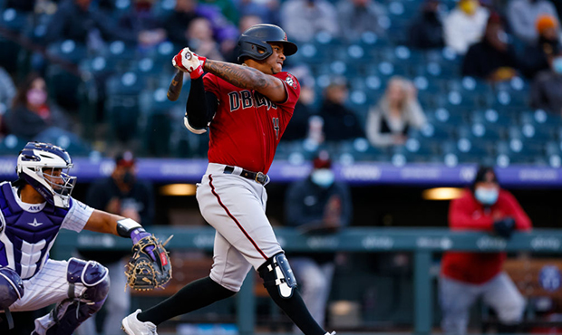 Ketel Marte #4 of the Arizona Diamondbacks bats during the first inning against the Colorado Rockie...