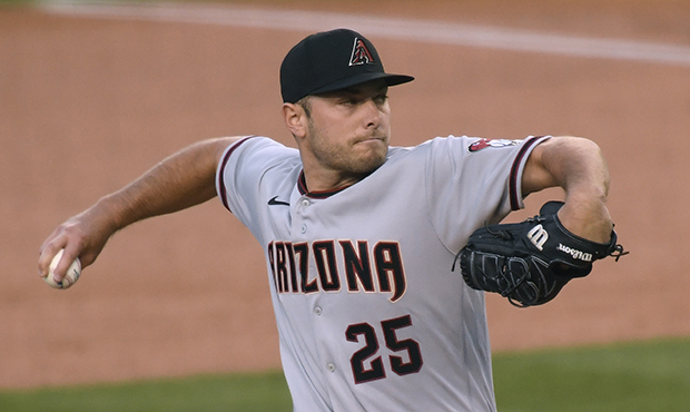 Corbin Martin #25 of the Arizona Diamondbacks pitches during the first inning against the Los Angel...