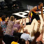 PHOENIX, ARIZONA - MAY 23: Mikal Bridges #25 of the Phoenix Suns reacts to a three-point shot against the Los Angeles Lakers during the first half of Game One of the Western Conference first-round playoff series at Phoenix Suns Arena on May 23, 2021 in Phoenix, Arizona. NOTE TO USER: User expressly acknowledges and agrees that, by downloading and or using this photograph, User is consenting to the terms and conditions of the Getty Images License Agreement.  (Photo by Christian Petersen/Getty Images)