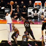 PHOENIX, ARIZONA - MAY 23: Anthony Davis #3 of the Los Angeles Lakers attempts a shot over Deandre Ayton #22 of the Phoenix Suns during the first half of Game One of the Western Conference first-round playoff series at Phoenix Suns Arena on May 23, 2021 in Phoenix, Arizona. NOTE TO USER: User expressly acknowledges and agrees that, by downloading and or using this photograph, User is consenting to the terms and conditions of the Getty Images License Agreement.  (Photo by Christian Petersen/Getty Images)