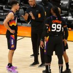 PHOENIX, ARIZONA - MAY 23: Head coach Monty Williams of the Phoenix Suns talks with Devin Booker #1 and Jae Crowder #99 during the second half of Game One of the Western Conference first-round playoff series against the Los Angeles Lakers at Phoenix Suns Arena on May 23, 2021 in Phoenix, Arizona. NOTE TO USER: User expressly acknowledges and agrees that, by downloading and or using this photograph, User is consenting to the terms and conditions of the Getty Images License Agreement.  (Photo by Christian Petersen/Getty Images)