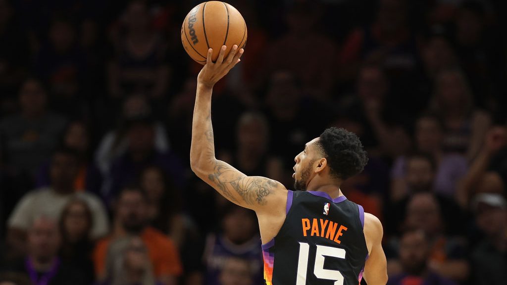 Cameron Payne #15 of the Phoenix Suns attempts a shot against the Dallas Mavericks during the first...