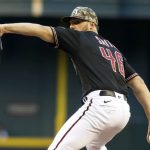 
              Arizona Diamondbacks' Riley Smith delivers a pitch against the Washington Nationals during the first inning of a baseball game Friday, May 14, 2021, in Phoenix. (AP Photo/Darryl Webb)
            