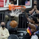 Phoenix Suns center Deandre Ayton dunks against the Los Angeles Lakers during the first half of Game 2 of their NBA basketball first-round playoff series Tuesday, May 25, 2021, in Phoenix. (AP Photo/Ross D. Franklin)
