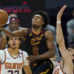 
              Cleveland Cavaliers' Collin Sexton, left, drives to the basket against Phoenix Suns' Dario Saric in the second half of an NBA basketball game, Tuesday, May 4, 2021, in Cleveland. (AP Photo/Tony Dejak)
            