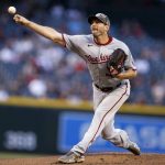 
              Washington Nationals' Max Scherzer delivers a pitch against the Arizona Diamondbacks during the first inning of a baseball game Friday, May 14, 2021, in Phoenix. (AP Photo/Darryl Webb)
            