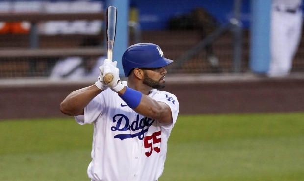 Los Angeles Dodgers' Albert Pujols bats during the first inning of a baseball game against the Ariz...