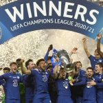 Chelsea's team captain Cesar Azpilicueta lifts the trophy at the end of the Champions League final soccer match between Manchester City and Chelsea at the Dragao Stadium in Porto, Portugal, Saturday, May 29, 2021. Chelsea won the match 1-0. (Pierre Philippe Marcou/Pool via AP)