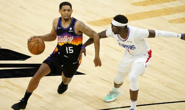 Phoenix Suns guard Cameron Payne (15) drives as Los Angeles Clippers guard Reggie Jackson (1) defen...