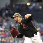 Arizona Diamondbacks pitcher Alex Young throws during the fifth inning of the team's baseball game against the Washington Nationals, Saturday, May 15, 2021, in Phoenix. (AP Photo/Rick Scuteri)