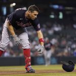 
              Washington Nationals' Ryan Zimmerman tosses his helmet down after striking out against the Arizona Diamondbacks during the first inning of a baseball game Sunday, May 16, 2021, in Phoenix. (AP Photo/Ross D. Franklin)
            