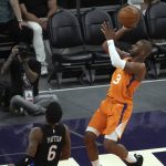 Phoenix Suns guard Chris Paul shoots over New York Knicks guard Elfrid Payton (6) during the second half of an NBA basketball game Friday, May 7, 2021, in Phoenix. Phoenix won 128-105. (AP Photo/Rick Scuteri)
