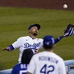 Los Angeles Dodgers right fielder Mookie Betts makes a catch on a ball hit by Arizona Diamondbacks' Tim Locastro during the seventh inning of a baseball game Monday, May 17, 2021, in Los Angeles. (AP Photo/Mark J. Terrill)
