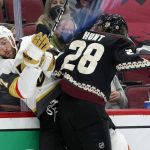 Arizona Coyotes left wing Dryden Hunt (28) checks Vegas Golden Knights defenseman Alex Pietrangelo (7) against the boards during the first period of an NHL hockey game Saturday, May 1, 2021, in Glendale, Ariz. (AP Photo/Ross D. Franklin)
