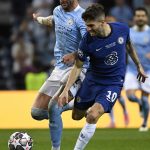 
              Manchester City's Kyle Walker, left, fights for the ball with Chelsea's Christian Pulisic during the Champions League final soccer match between Manchester City and Chelsea at the Dragao Stadium in Porto, Portugal, Saturday, May 29, 2021. (Pierre Philippe Marcou/Pool via AP)
            