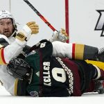 Arizona Coyotes right wing Clayton Keller (9) takes down Vegas Golden Knights right wing Mark Stone (61) during the second period of an NHL hockey game Saturday, May 1, 2021, in Glendale, Ariz. Both players were penalized. (AP Photo/Ross D. Franklin)