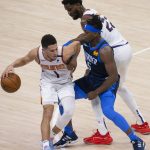 Phoenix Suns guard Devin Booker (1) and center Deandre Ayton (22) goes against Oklahoma City Thunder forward Luguentz Dort (5) during the first half of an NBA basketball game, Sunday, May 2, 2021, in Oklahoma City. (AP Photo/Garett Fisbeck)