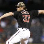 Arizona Diamondbacks' Kevin Ginkel delivers a pitch against the Washington Nationals during the sixth inning of a baseball game Friday, May 14, 2021, in Phoenix. (AP Photo/Darryl Webb)