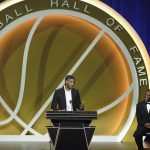 
              Tim Duncan speaks as presenter David Robinson, right, listens, as Duncan is enshrined with th 2020 Basketball Hall of Fame class Saturday, May 15, 2021, in Uncasville, Conn. (AP Photo/Kathy Willens)
            