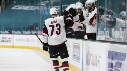 Arizona Coyotes right wing Jan Jenik (73) is congratulated after scoring a goal against the San Jos...