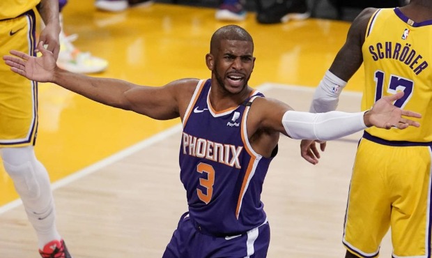 Phoenix Suns guard Chris Paul (3) argues a call during the first half in Game 3 of an NBA basketbal...