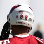 Arizona Cardinals wide receiver Rondale Moore adjusts his helmet during rookie minicamp Friday, May 14, 2021, in Tempe, Ariz. (Tyler Drake/Arizona Sports)