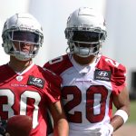 Arizona Cardinals cornerback Marco Wilson and wide receiver Andre Baccellia run through drills during rookie minicamp Friday, May 14, 2021, in Tempe, Ariz. (Tyler Drake/Arizona Sports)