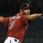 PHOENIX, ARIZONA - JUNE 02: Madison Bumgarner #40 of the Arizona Diamondbacks delivers a first inning pitch against the New York Mets at Chase Field on June 02, 2021 in Phoenix, Arizona. (Photo by Norm Hall/Getty Images)