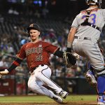 PHOENIX, ARIZONA - JUNE 02: Pavin Smith #26 of the Arizona Diamondbacks scores on a single by Ildemaro Vargas #8 against the New York Mets during the sixth inning at Chase Field on June 02, 2021 in Phoenix, Arizona. (Photo by Norm Hall/Getty Images)