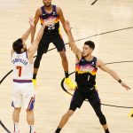 PHOENIX, ARIZONA - JUNE 09:  Facundo Campazzo #7 of the Denver Nuggets attempts a three-point shot over Devin Booker #1 of the Phoenix Suns during the first half in Game Two of the Western Conference second-round playoff series at Phoenix Suns Arena on June 09, 2021 in Phoenix, Arizona. (Photo by Christian Petersen/Getty Images)  