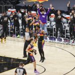 PHOENIX, ARIZONA - JUNE 22: Deandre Ayton #22 of the Phoenix Suns celebrates in the final minutes against the LA Clippers in game two of the NBA Western Conference finals at Phoenix Suns Arena on June 22, 2021 in Phoenix, Arizona. NOTE TO USER: User expressly acknowledges and agrees that, by downloading and or using this photograph, User is consenting to the terms and conditions of the Getty Images License Agreement.  (Photo by Christian Petersen/Getty Images)
