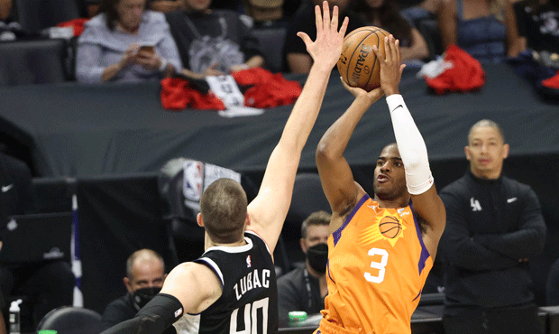 Chris Paul of the Phoenix Suns shoots against Ivica Zubac of the LA Clippers during the first half ...