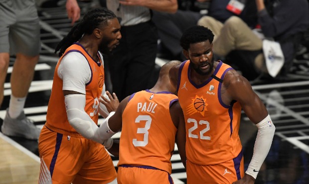 Deandre Ayton #22 of the Phoenix Suns reacts after a blocked shot against the LA Clippers during th...