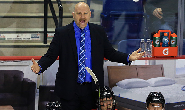 Head Coach Andre Tourigny of the Ottawa 67's shouts to the referee during the second period of an O...