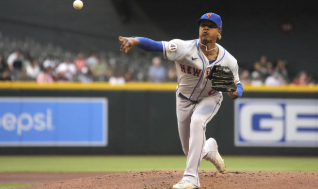 New York Mets pitcher Marcus Stroman throws against the Arizona Diamondbacks in the first inning of...
