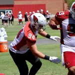 Defensive linemen Zach Allen (94) and David Parry (93) avoid a collision during the Cardinals' final day of mandatory minicamp on Thursday, June 10, 2021, in Tempe. (Tyler Drake/Arizona Sports)