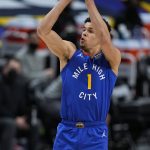 Denver Nuggets forward Michael Porter Jr. (1) shoots against the Portland Trail Blazers during the first half of Game 5 of a first-round NBA basketball playoff series Tuesday, June 1, 2021, in Denver. (AP Photo/Jack Dempsey)