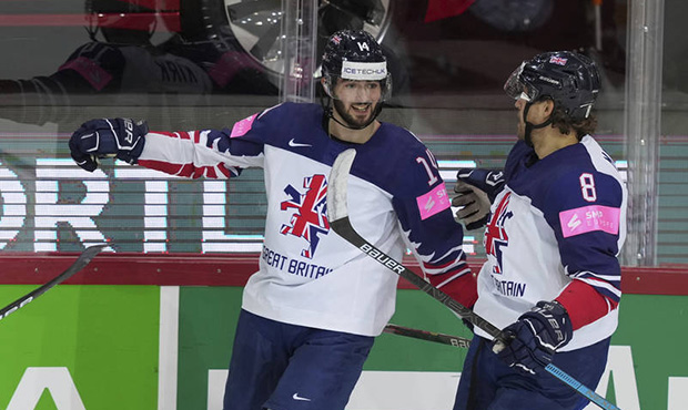 Liam Kirk and Matthew Myers celebrate a goal during the Ice Hockey World Championship group A match...