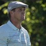 Bryson DeChambeau reacts to his shot off the 13th tee during the first round of the Travelers Championship golf tournament at TPC River Highlands, Thursday, June 24, 2021, in Cromwell, Conn. (AP Photo/John Minchillo)