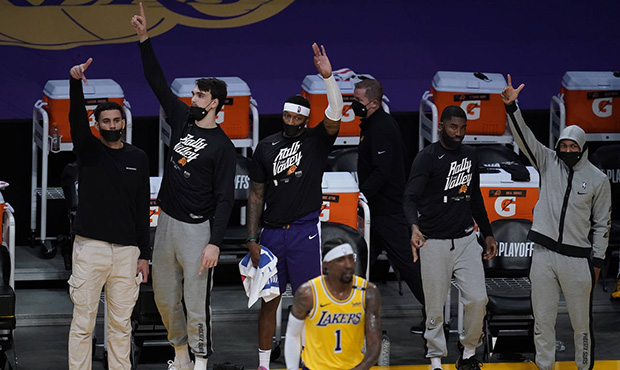 The Phoenix Suns celebrate after scoring a three-pointer during the fourth quarter of Game 6 of an ...