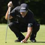 Phil Mickelson lines up his shot on the 11th green during the first round of the Travelers Championship golf tournament at TPC River Highlands, Thursday, June 24, 2021, in Cromwell, Conn. (AP Photo/John Minchillo)