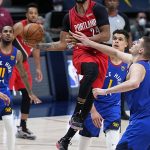Portland Trail Blazers forward Norman Powell (24) shoots against the Denver Nuggets during the second half of Game 5 of a first-round NBA basketball playoff series Tuesday, June 1, 2021, in Denver. (AP Photo/Jack Dempsey)