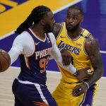 
              Los Angeles Lakers forward LeBron James (23) defends against Phoenix Suns forward Jae Crowder (99) during the second quarter of Game 6 of an NBA basketball first-round playoff series Thursday, Jun 3, 2021, in Los Angeles. (AP Photo/Ashley Landis)
            