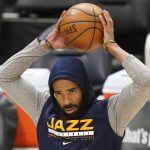 Utah Jazz guard Mike Conley stands on the court before Game 1 of the team's second-round NBA basketball playoff series against the Los Angeles Clippers on Tuesday, June 8, 2021, in Salt Lake City. Conley suffered a mild right hamstring strain in Game 5 against the Grizzlies, and he has been ruled out of Tuesday night's game. (AP Photo/Rick Bowmer)