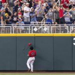 
              Arizona's Donta Williams (23) watches as a two-run home run hit by Vanderbilt's Jayson Gonzalez in the fourth inning during a baseball game in the College World Series, Saturday, June 19, 2021, at TD Ameritrade Park in Omaha, Neb. (AP Photo/Rebecca S. Gratz)
            