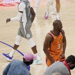 Phoenix Suns guard Chris Paul, right, celebrates as time runs out while Los Angeles Clippers guard Reggie Jackson walks way in Game 4 of the NBA basketball Western Conference Finals Saturday, June 26, 2021, in Los Angeles. The Suns won 84-80. (AP Photo/Mark J. Terrill)