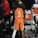 Phoenix Suns head coach Monty Williams hugs Chris Paul as they celebrate in the final seconds of Game 6 of the NBA basketball Western Conference Finals Wednesday, June 30, 2021, in Los Angeles. The Sun won 130-103. (AP Photo/Jae C. Hong)