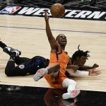 Phoenix Suns' Chris Paul retrieves the ball against Los Angeles Clippers' Terance Mann during the second half in Game 6 of the NBA basketball Western Conference Finals Wednesday, June 30, 2021, in Los Angeles. (AP Photo/Jae C. Hong)
