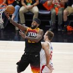 Utah Jazz forward Royce O'Neale (23) goes to the basket as Los Angeles Clippers guard Luke Kennard (5) defends during the second half of Game 1 of a second-round NBA basketball playoff series Tuesday, June 8, 2021, in Salt Lake City. (AP Photo/Rick Bowmer)