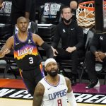 Phoenix Suns guard Chris Paul (3) watches his shot go through the hoop as Los Angeles Clippers forward Marcus Morris Sr. (8) looks on during the first half of game 5 of the NBA basketball Western Conference Finals, Monday, June 28, 2021, in Phoenix. (AP Photo/Matt York)